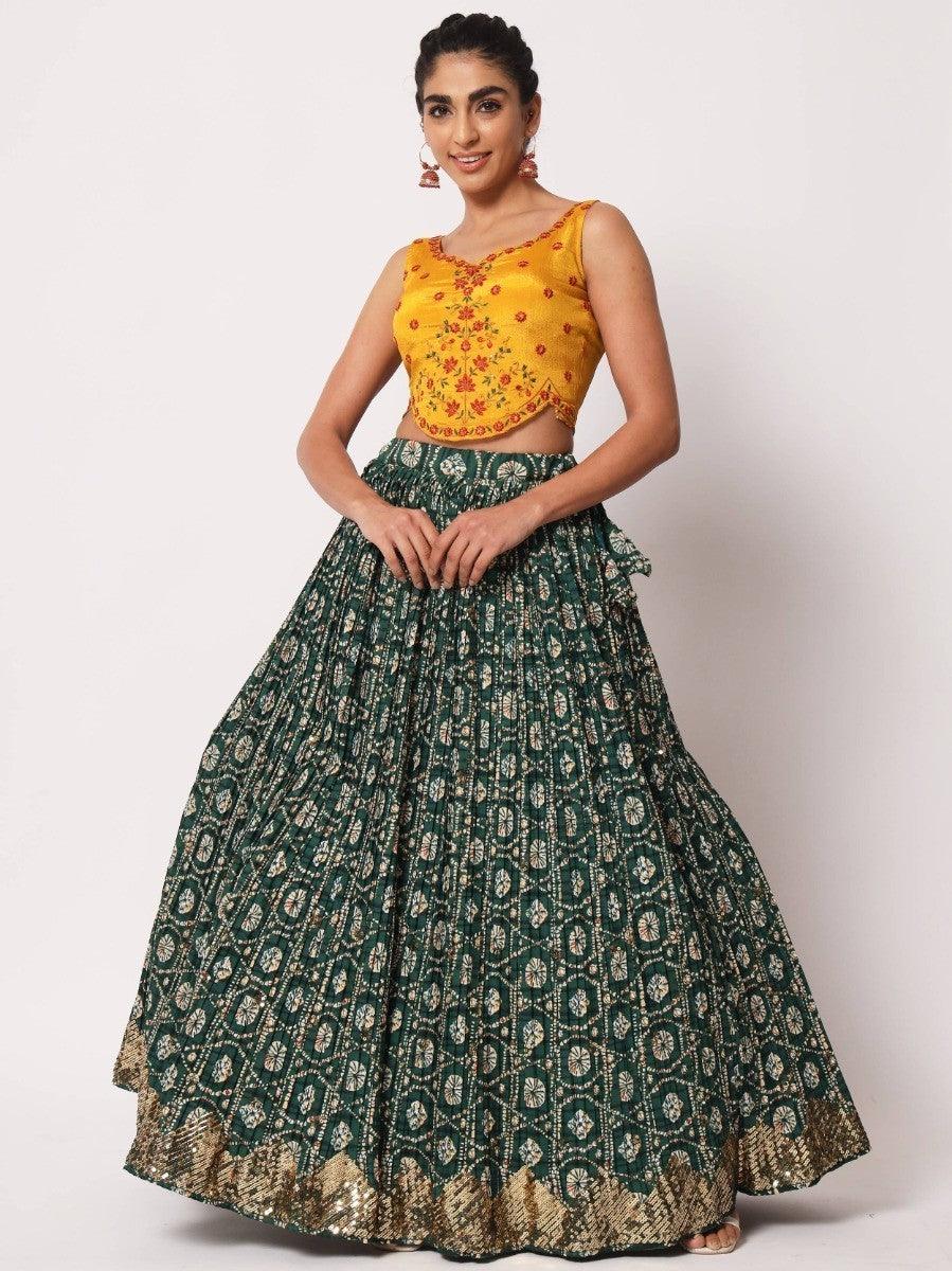 Traditional green art silk lehenga set for weddings and events.