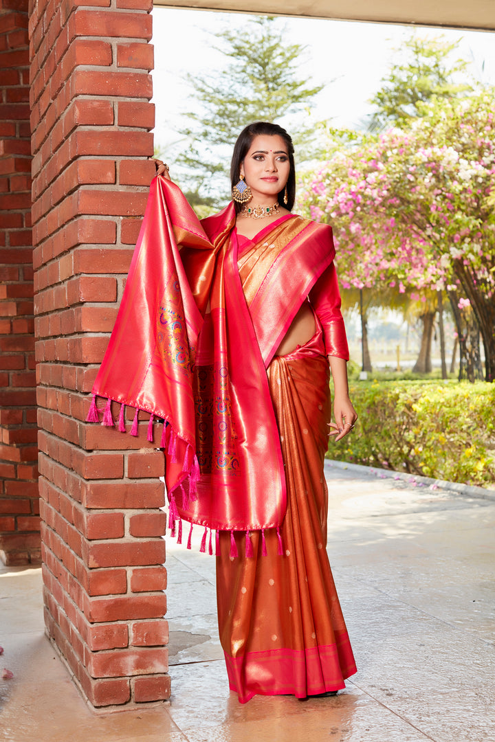 Beautiful red tissue silk saree with luxurious pallu and contrast blouse, perfect for weddings and ceremonies.