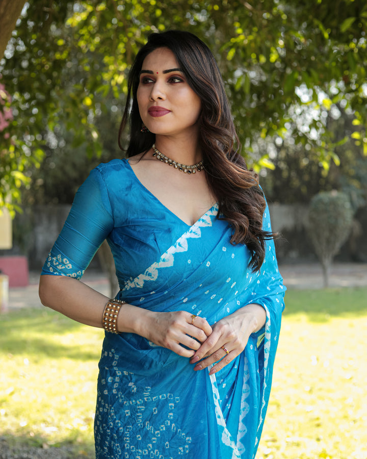 Elegant Sky-Blue Bandhej Silk Saree with original design and Zari weaving, perfect for weddings.