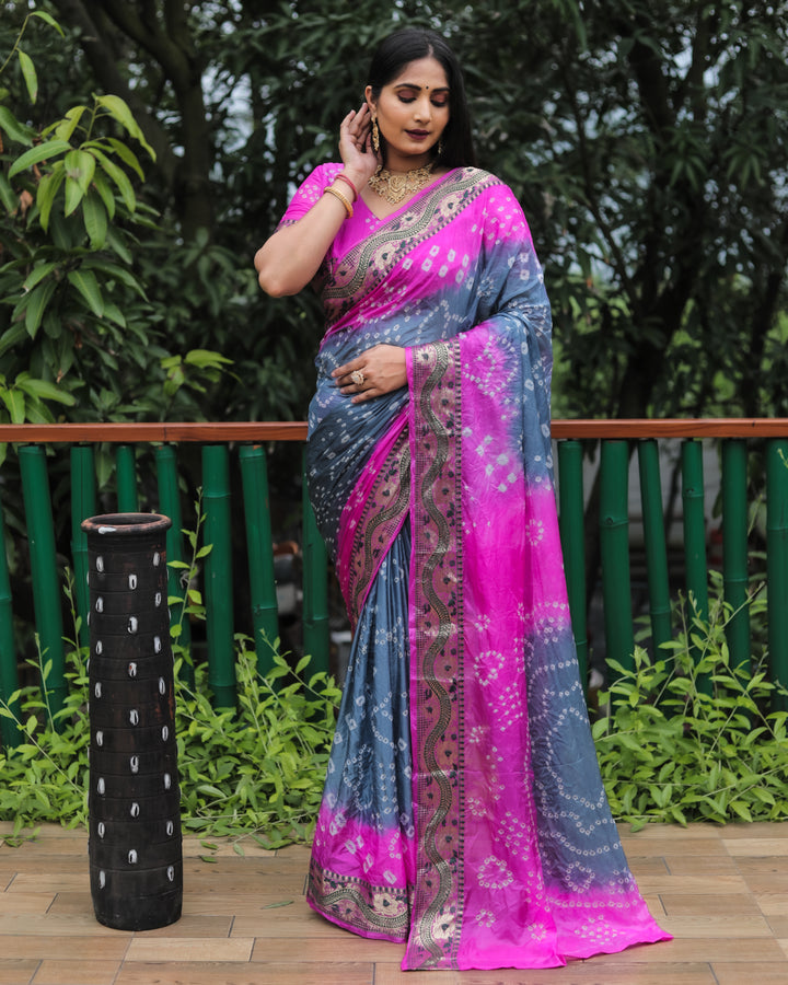 Grey Bandhej Tapeta silk saree with unique dual-tone colors and detailed Bandhej craftsmanship.