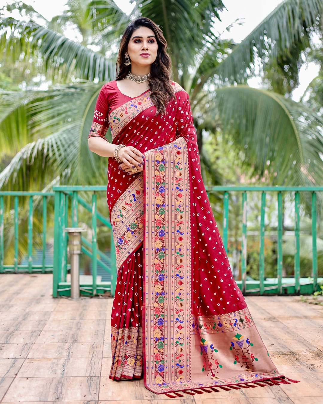 Classic Paithani Bandhej silk sadi with traditional motifs and colors like purple, red, and black.