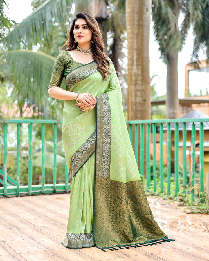 Stunning Pista-Green Pure Kanjivaram Saree with Leheriya pattern and heavy border, perfect for weddings.