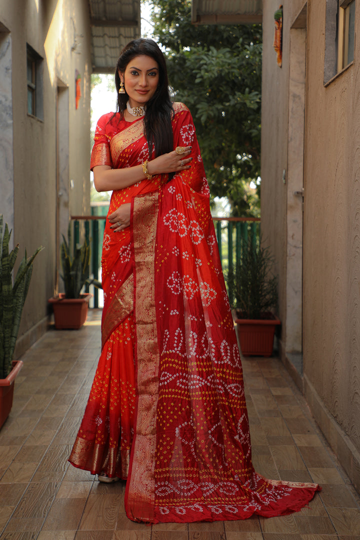 Elegant olive Bandhej Tapeta saree, ideal for weddings and cultural events.