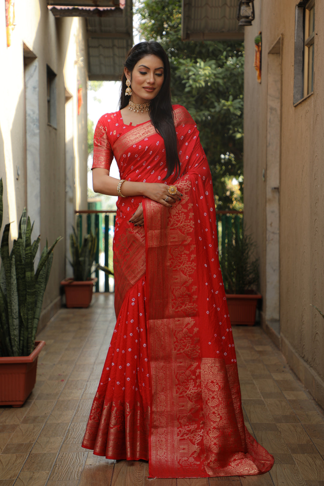 Stunning teal-green Kanjivaram silk saree with intricate detailing and pallu, perfect for celebrations.