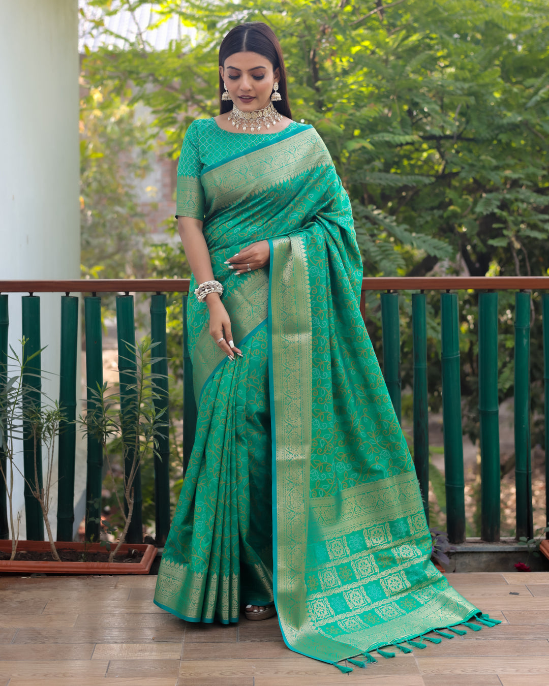 Mint-green Patola Silk Saree with rich Zari & Kanchi borders, perfect for USA festive and cultural events.