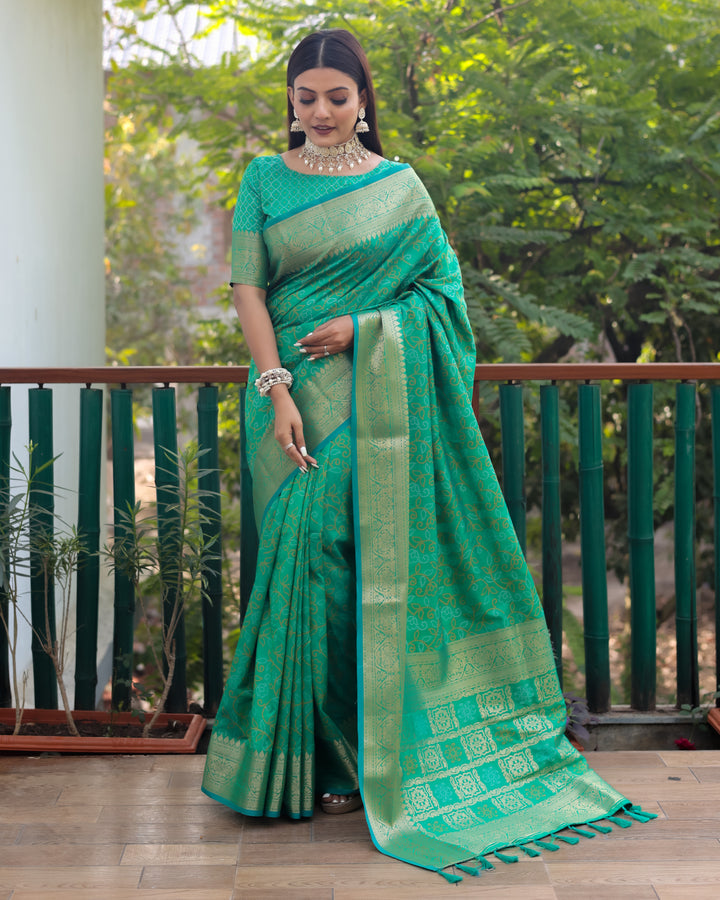 Mint-green Patola Silk Saree with rich Zari & Kanchi borders, perfect for USA festive and cultural events.