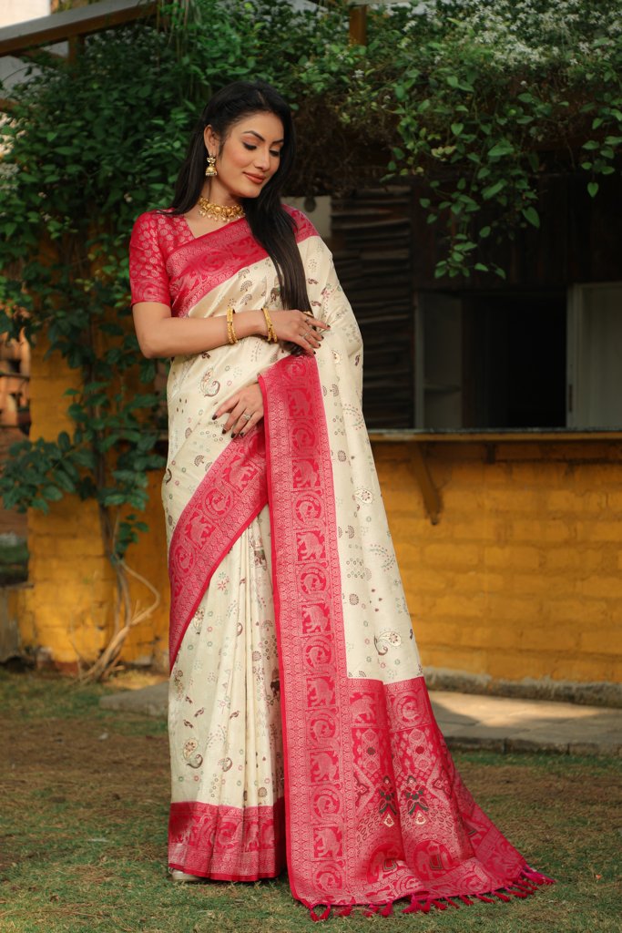 Luxurious pink Kanjivaram silk saree with beautiful weaving and traditional borders, perfect for grand celebrations.