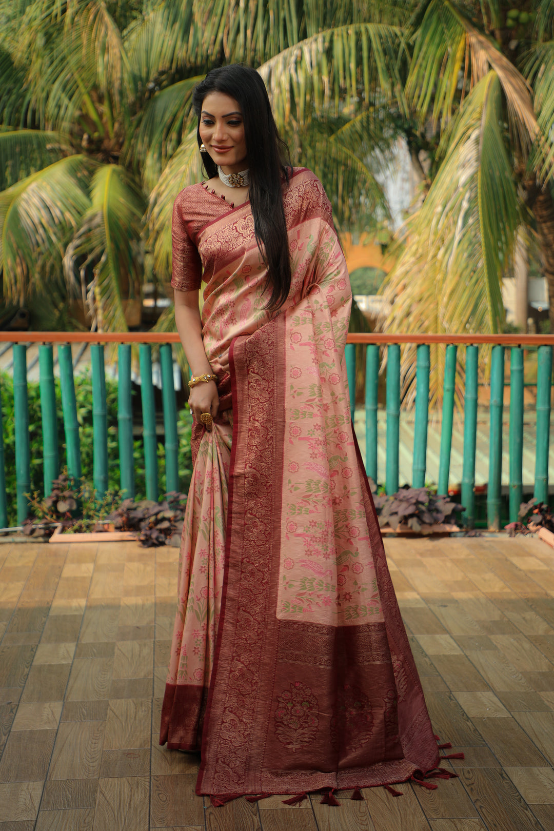 Elegant peach Kanjivaram soft silk saree with intricate detailing and a heavy blouse, perfect for weddings and events.