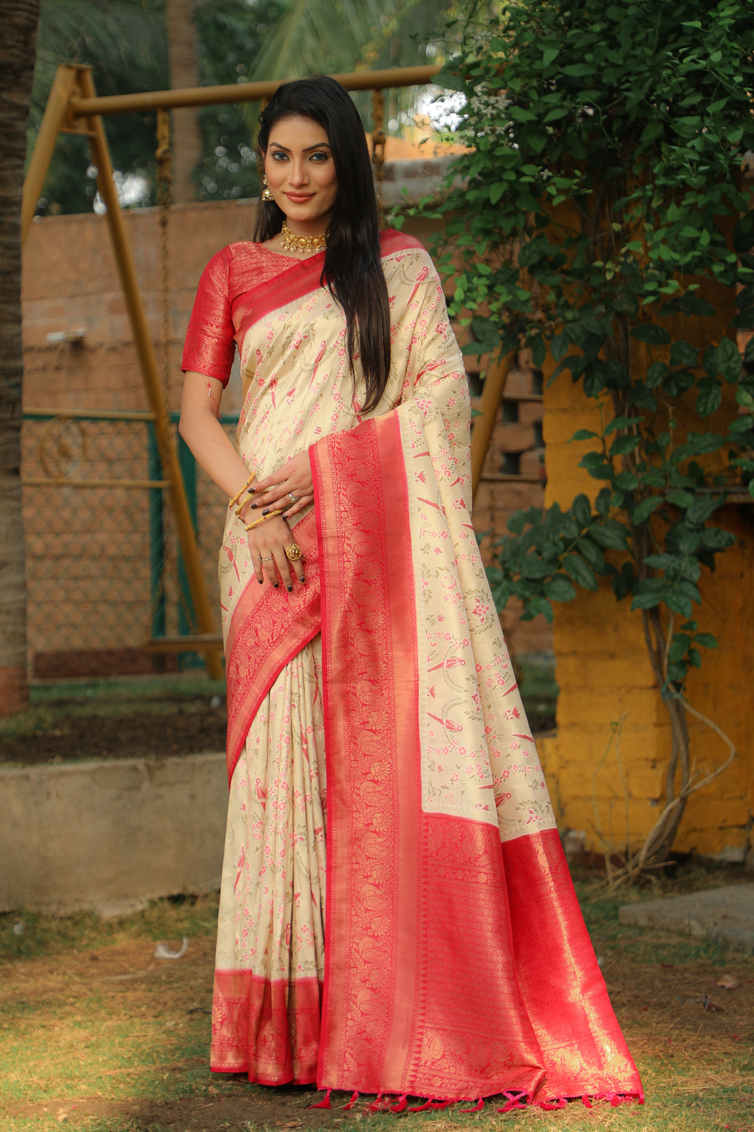 Elegant cream Designer saree made from Kanjivaram silk, perfect for adding grace to any festive occasion.