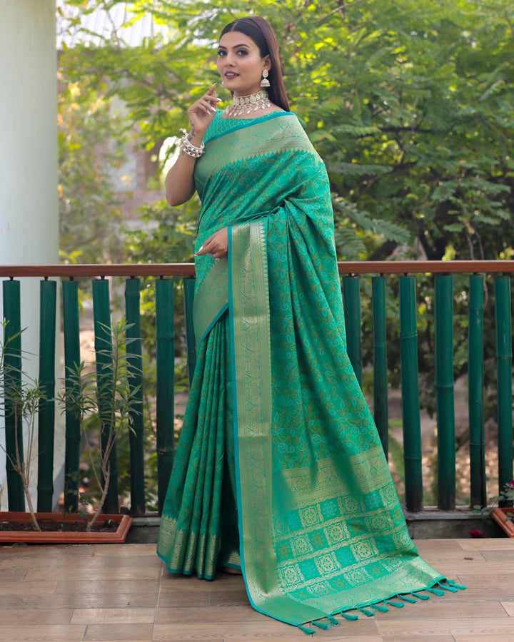 Handloom Bandhej Patola Silk Saree in mint-green with intricate Zari & Kanchi borders, ideal for USA weddings.