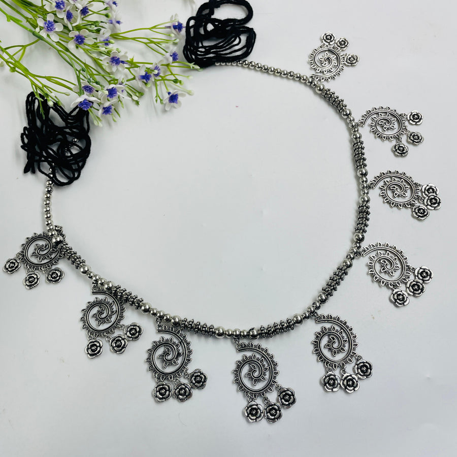 Sophisticated oxidised kamarband, a lovely waist accessory for festive wear.