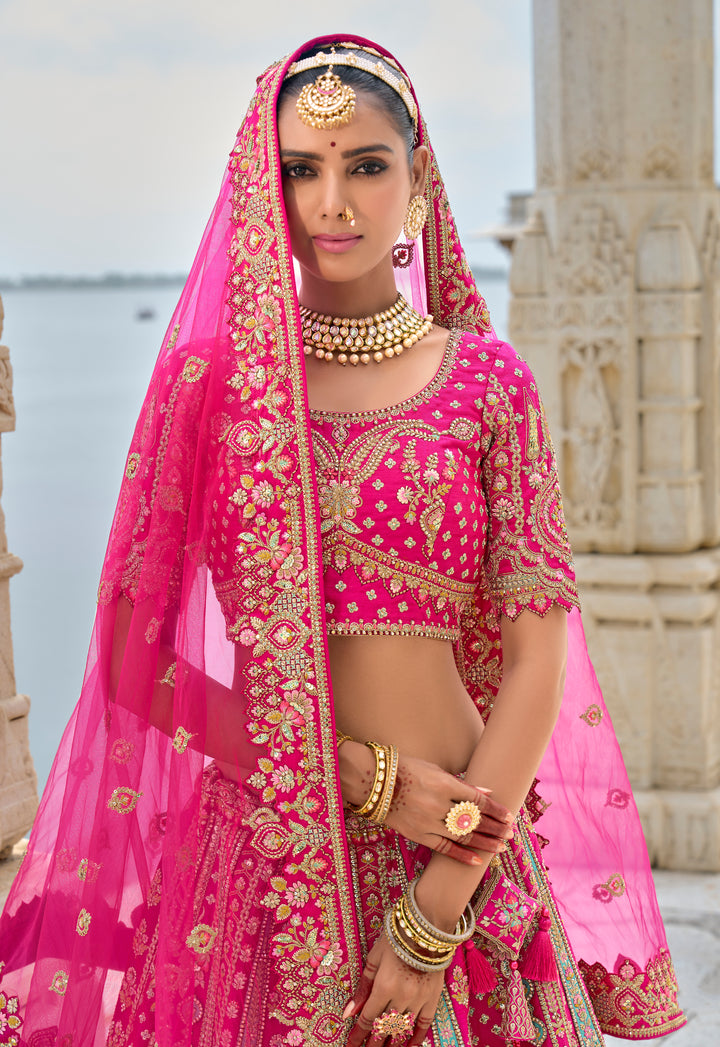 Rani Pink Silk & Art Silk Lehenga Choli with Heavy Thread Embroidery, Zari, and Sequins Work