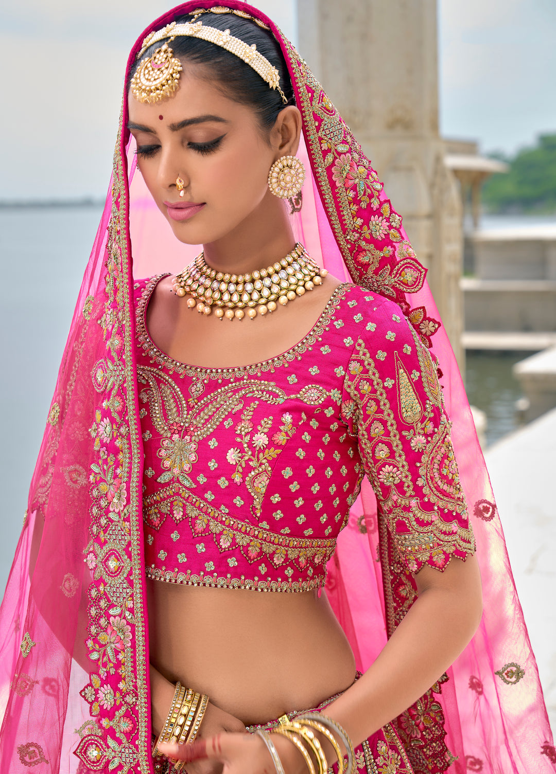 Rani Pink Silk & Art Silk Lehenga Choli with Heavy Thread Embroidery, Zari, and Sequins Work