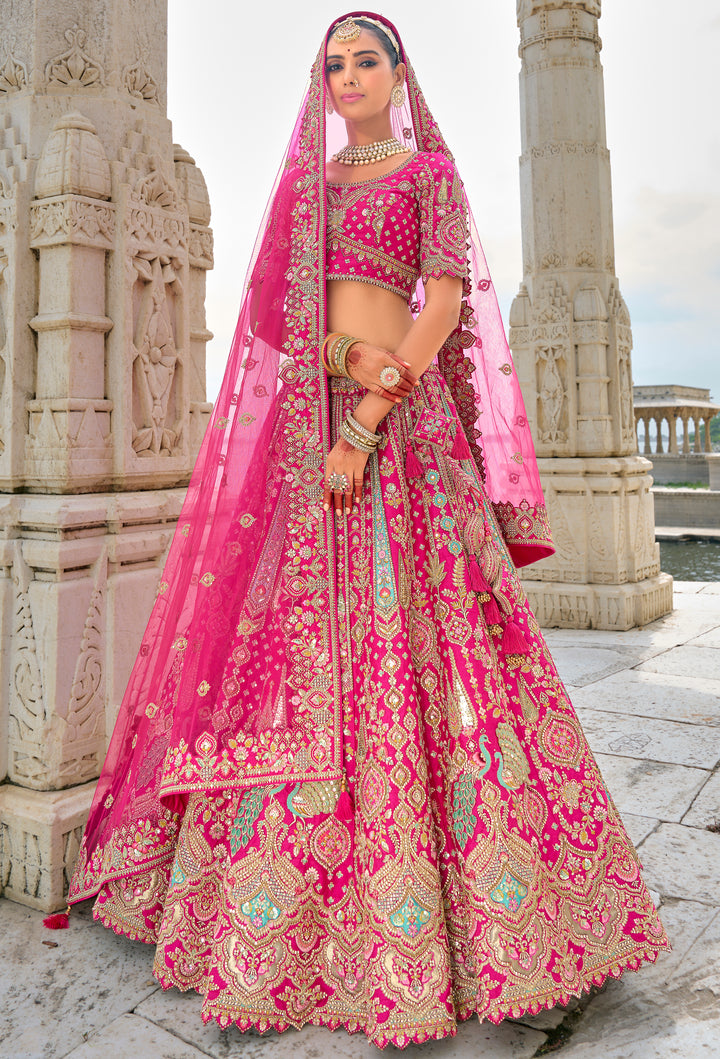 Rani Pink Silk & Art Silk Lehenga Choli with Heavy Thread Embroidery, Zari, and Sequins Work