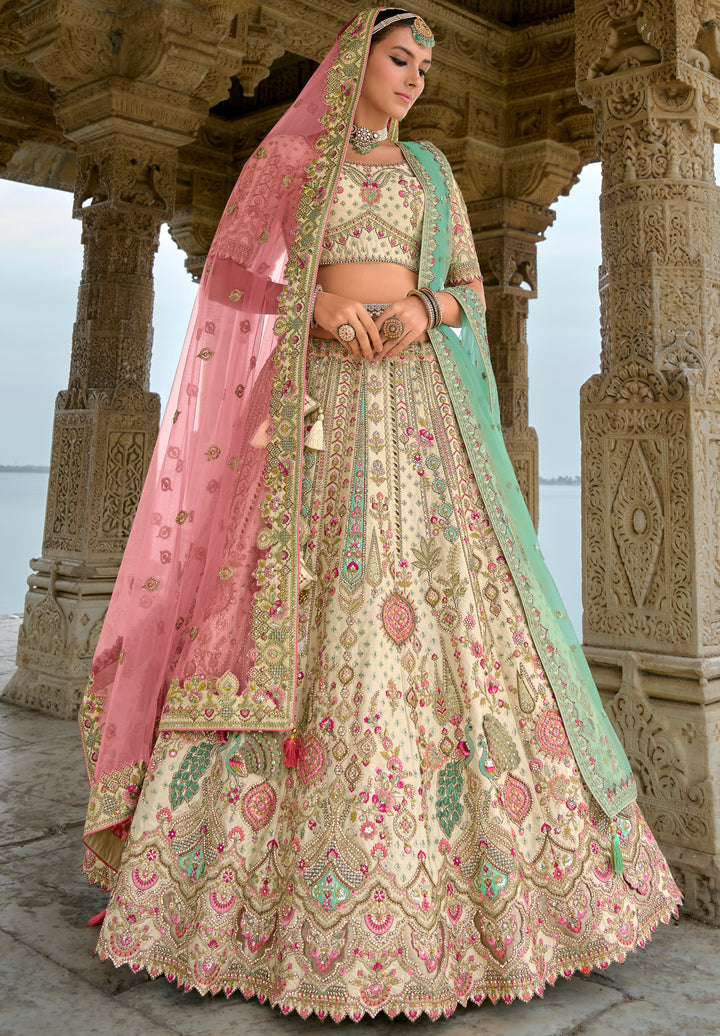 Cream Silk & Art Silk Lehenga Choli with Heavy Thread Embroidery, Zari, and Pink Sequins Work