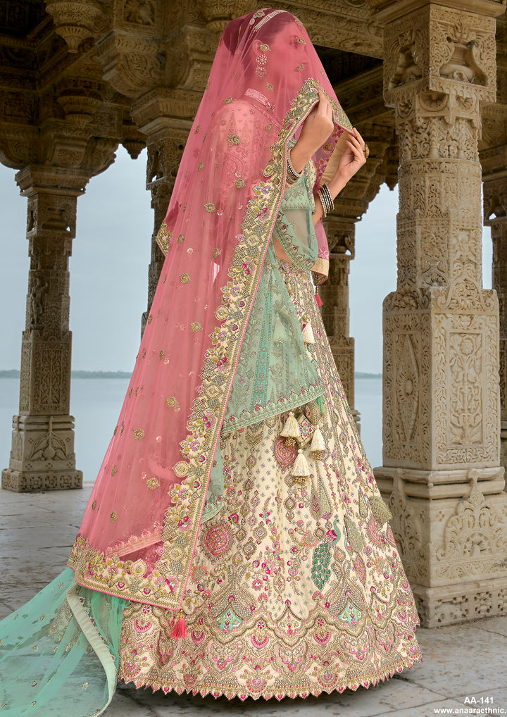 Cream Silk & Art Silk Lehenga Choli with Heavy Thread Embroidery, Zari, and Pink Sequins Work