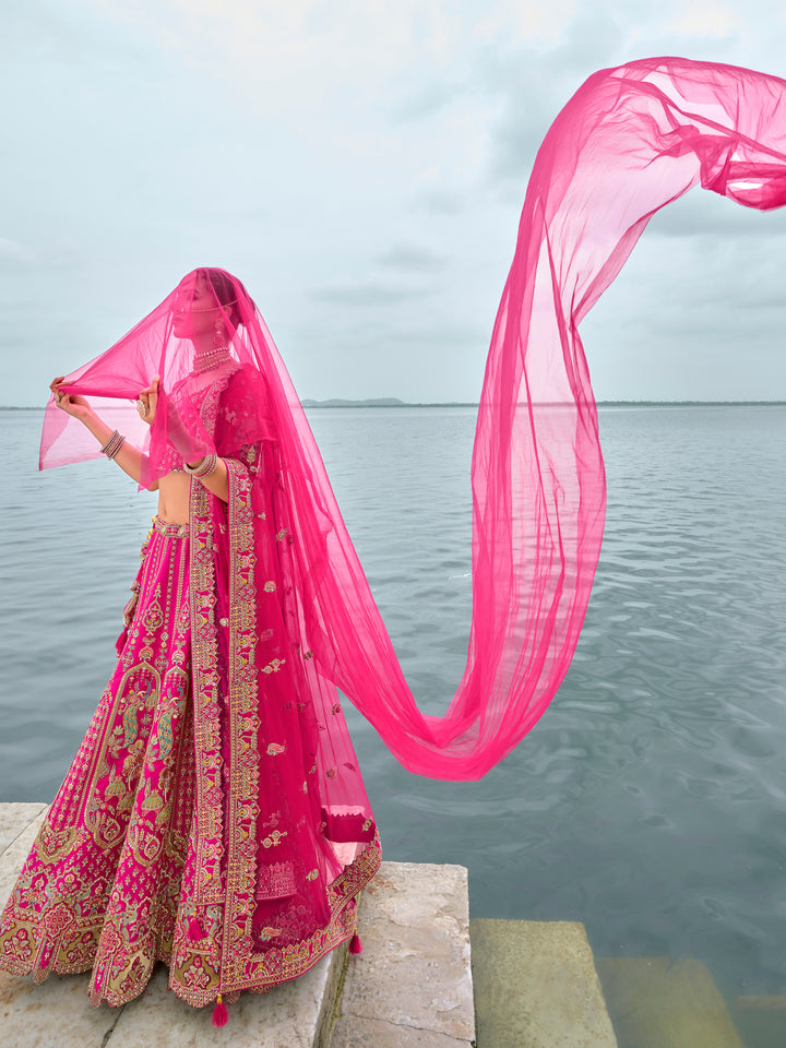 Rani Pink Silk & Art Silk Lehenga Choli with Heavy Thread Embroidery, Zari, and Sequins Work