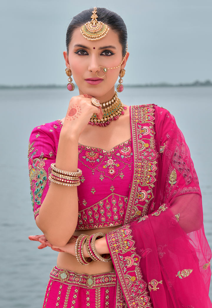 Rani Pink Silk & Art Silk Lehenga Choli with Heavy Thread Embroidery, Zari, and Sequins Work