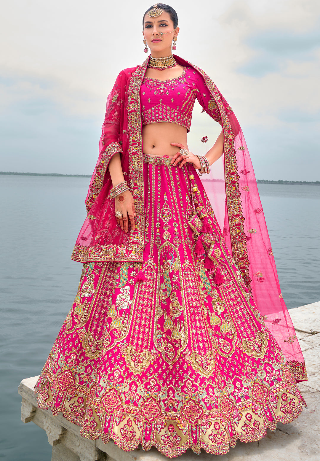 Rani Pink Silk & Art Silk Lehenga Choli with Heavy Thread Embroidery, Zari, and Sequins Work