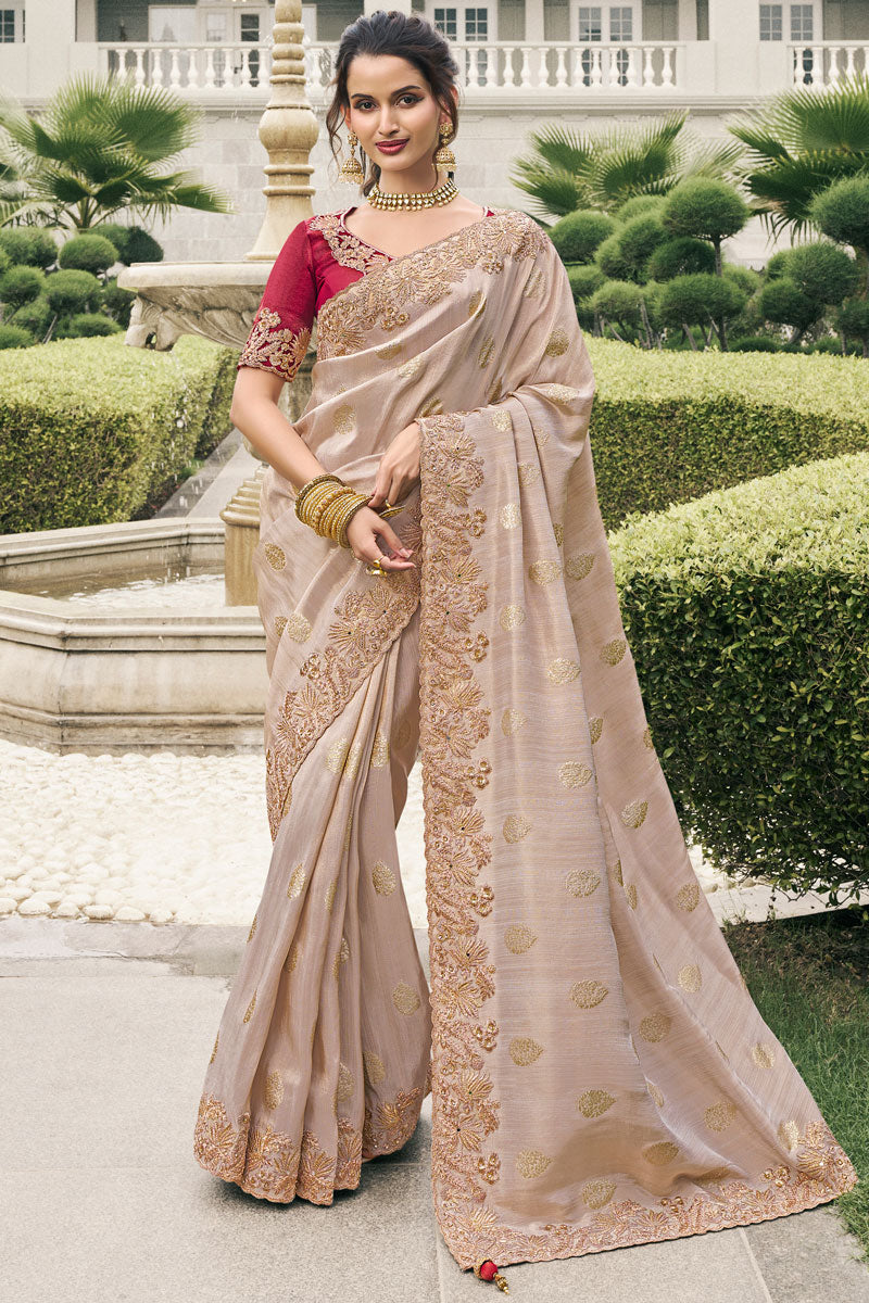 Exquisite Beige Saree with Gold Detailing | Embroidered Motifs & Red Blouse