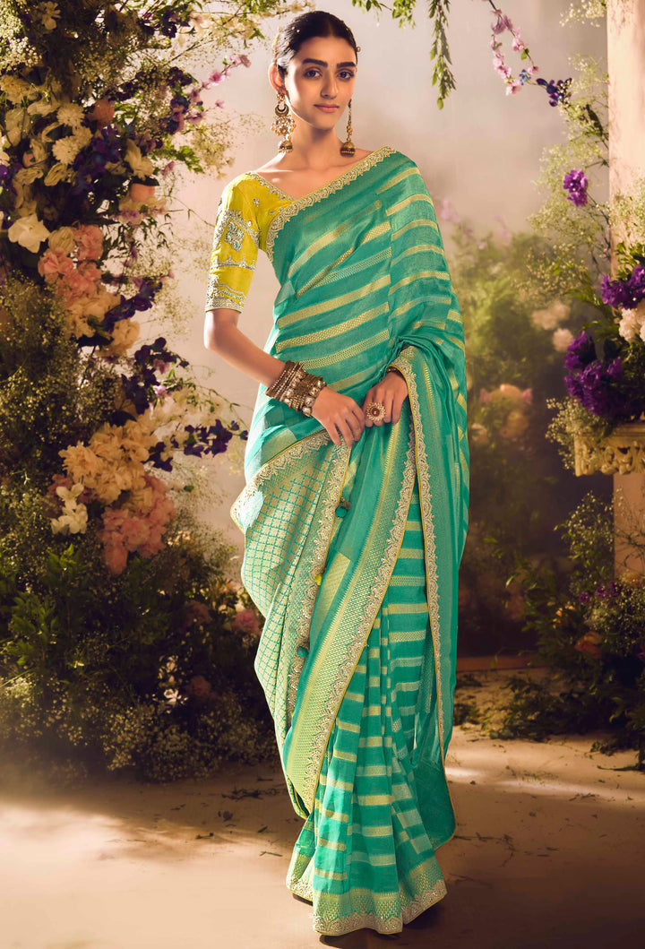 Rama Green Silk Saree with Jacquard Woven Design, Embroidered Lace Border & Lemon Blouse