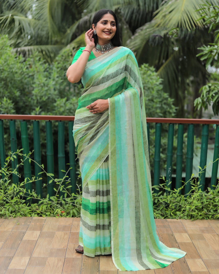 Elevate your festive wardrobe with this elegant green Moss chiffon saree, featuring delicate gold foil accents and an intricate design.