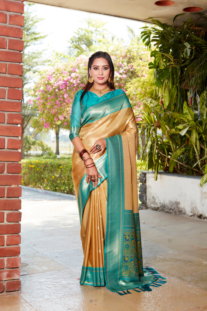 Graceful yellow tissue silk saree with intricate pallu and contrast blouse, perfect for weddings and cultural events.