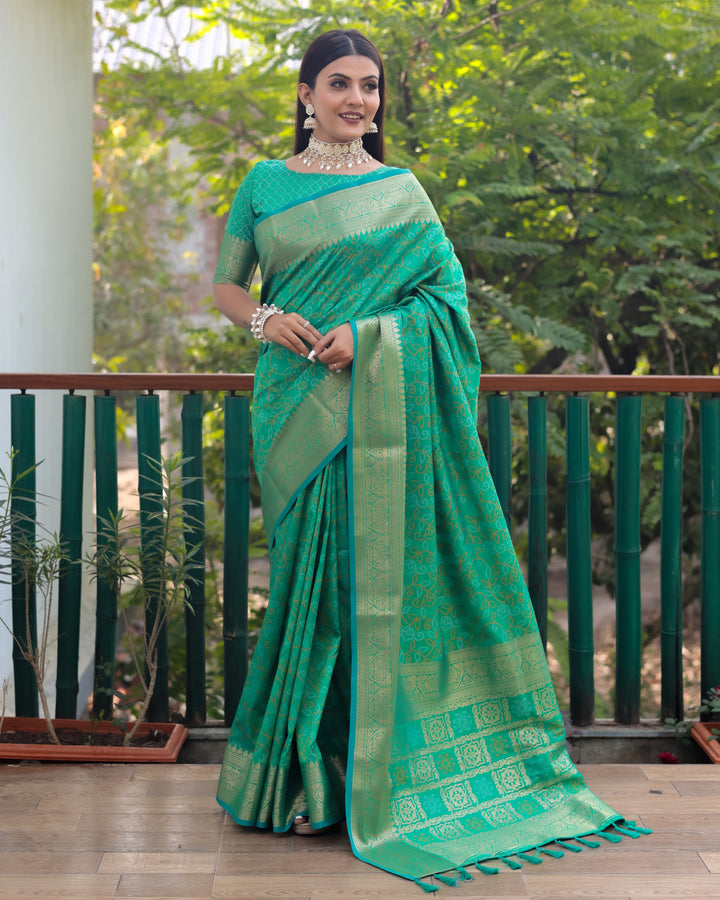 Elegant mint-green Patola Silk Saree featuring Zari & Kanchi borders, perfect for special USA occasions.