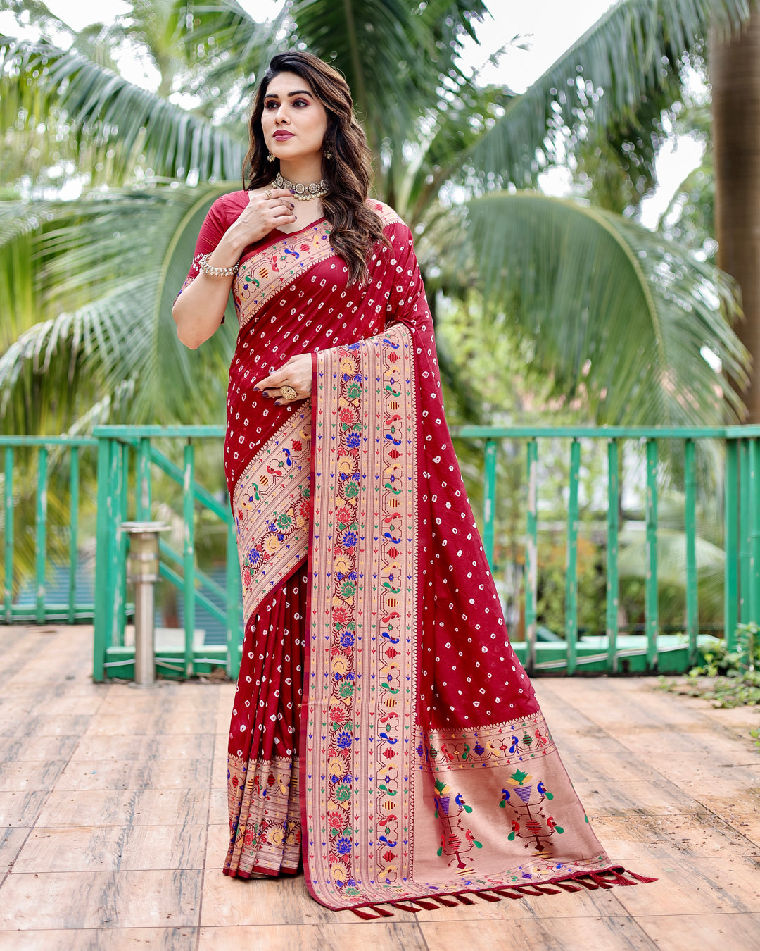 Paithani Bandhej silk sadi in black and green with rich traditional design elements and craftsmanship.