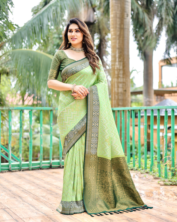 Pista-Green Pure Kanjivaram Saree with Leheriya design and beautiful heavy border for traditional wear.