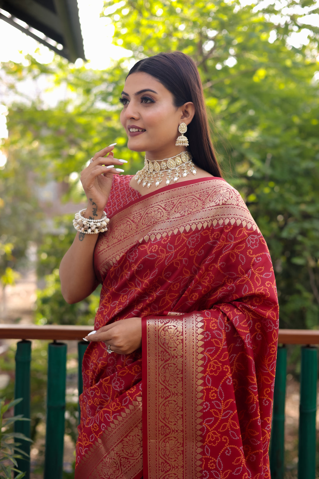 Bright-pink Pure Handloom Bandhej Patola Silk Saree with Zari & Kanchi Borders, ideal for USA traditional wear.