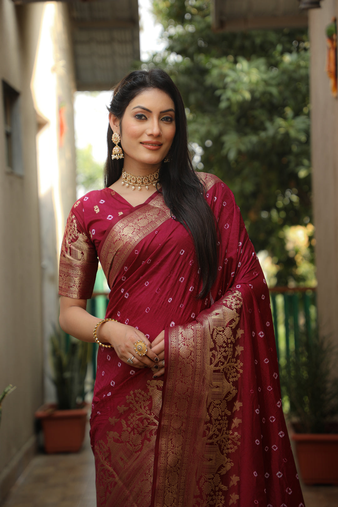 Timeless red Kanjivaram silk saree with luxurious design and exquisite craftsmanship.