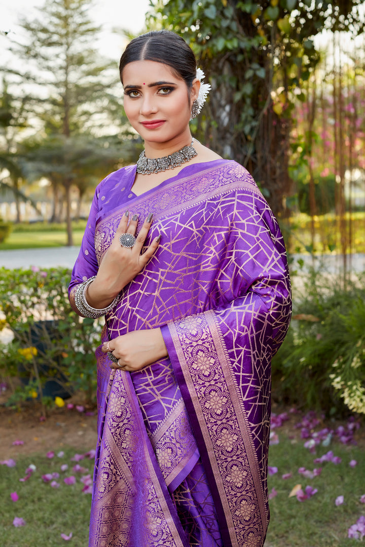 Gorgeous dark-green Kanjivaram soft satin silk saree with intricate butta work, perfect for bridal and festive occasions.