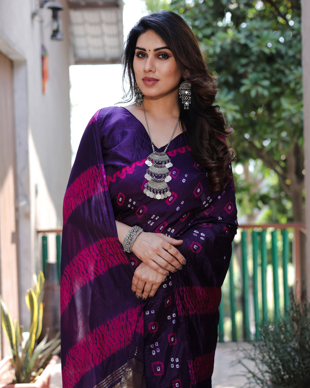 Elegant dark purple Bandhej silk saree featuring intricate Sibory work and a rich tissue pallu, perfect for weddings.