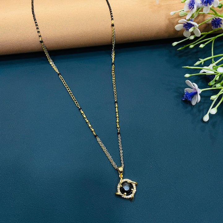 Classic mangalsutra in black and gold, crafted from durable alloy, ideal for women.