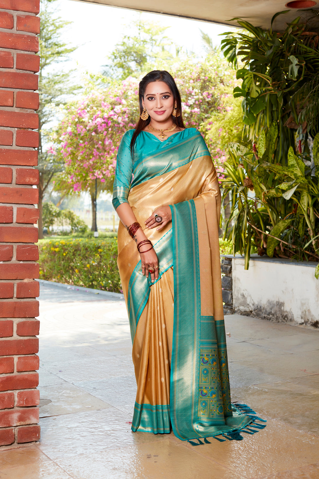 Beautiful yellow tissue silk saree with luxurious pallu and contrast blouse, ideal for festive occasions.