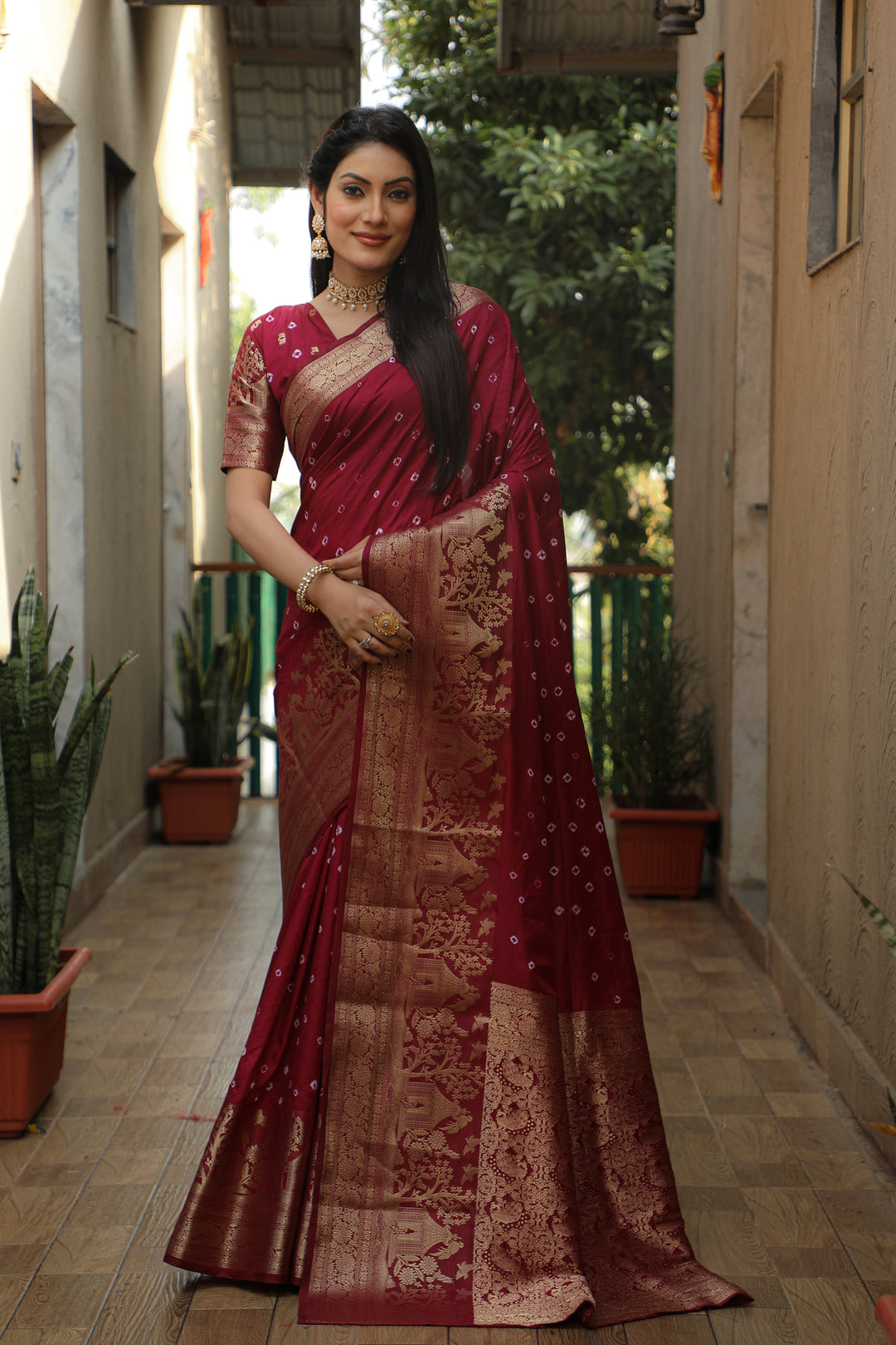 Stunning red Kanjivaram silk saree with vibrant pallu, perfect for traditional events.