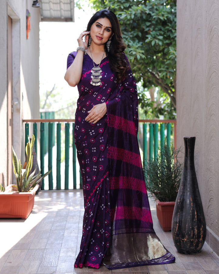 Beautiful dark purple Bandhej silk saree with exquisite traditional motifs and Zari weaving, perfect for festive events.