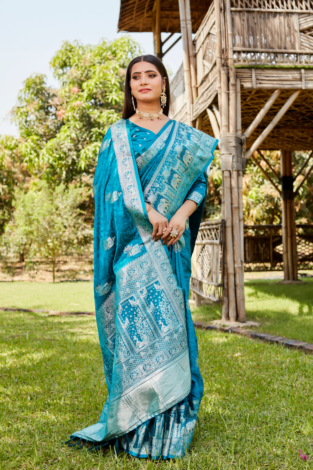 Beautiful sky blue satin Kanjivaram saree with a vibrant elephant border, perfect for weddings and cultural celebrations.