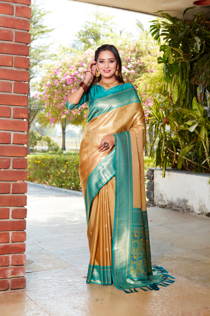 Traditional yellow tissue silk saree with vibrant pallu and contrast blouse, perfect for cultural celebrations.