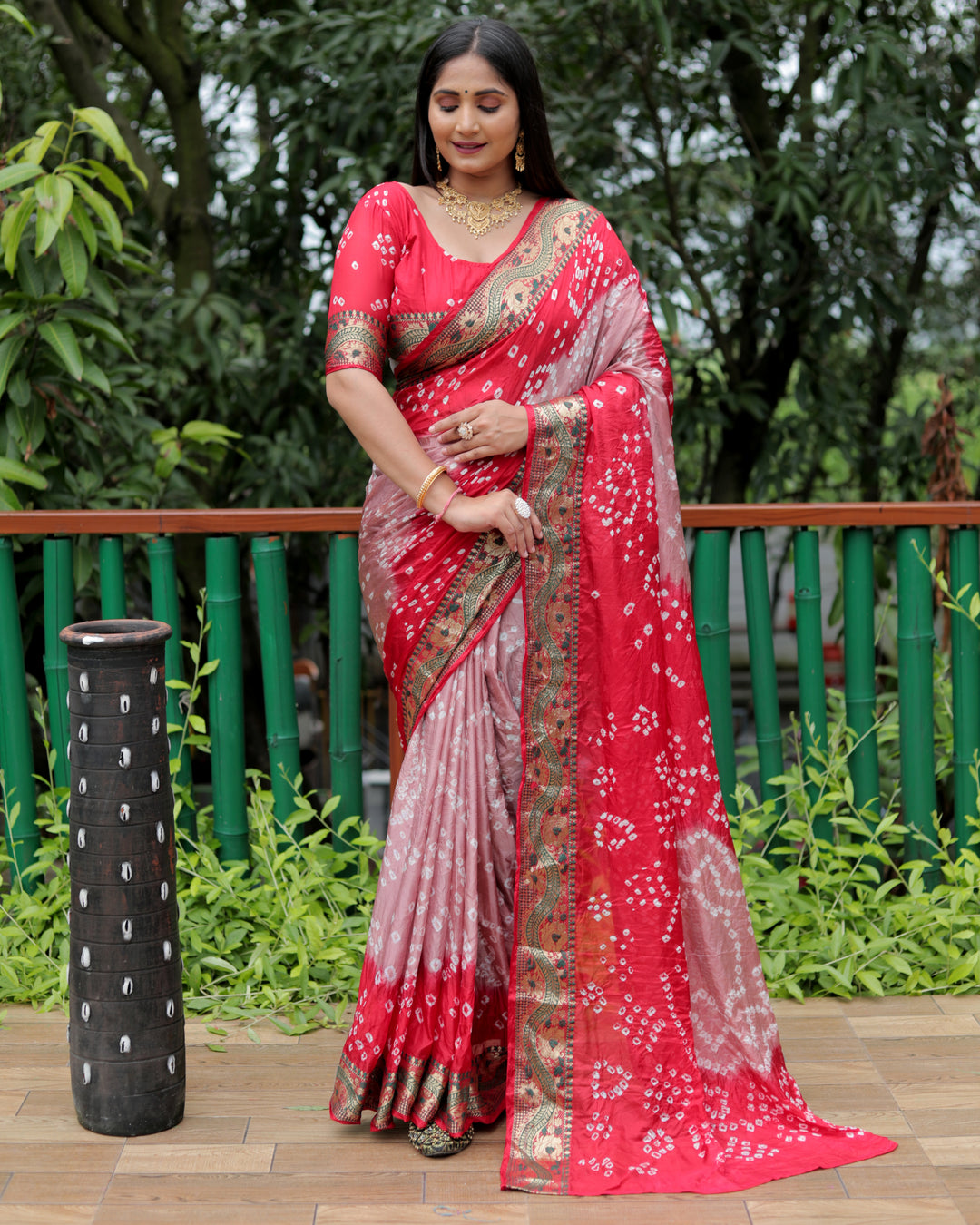 Coral-pink Bandhej Tapeta silk saree with elegant dual-color design and beautiful Bandhej tie-dye work.