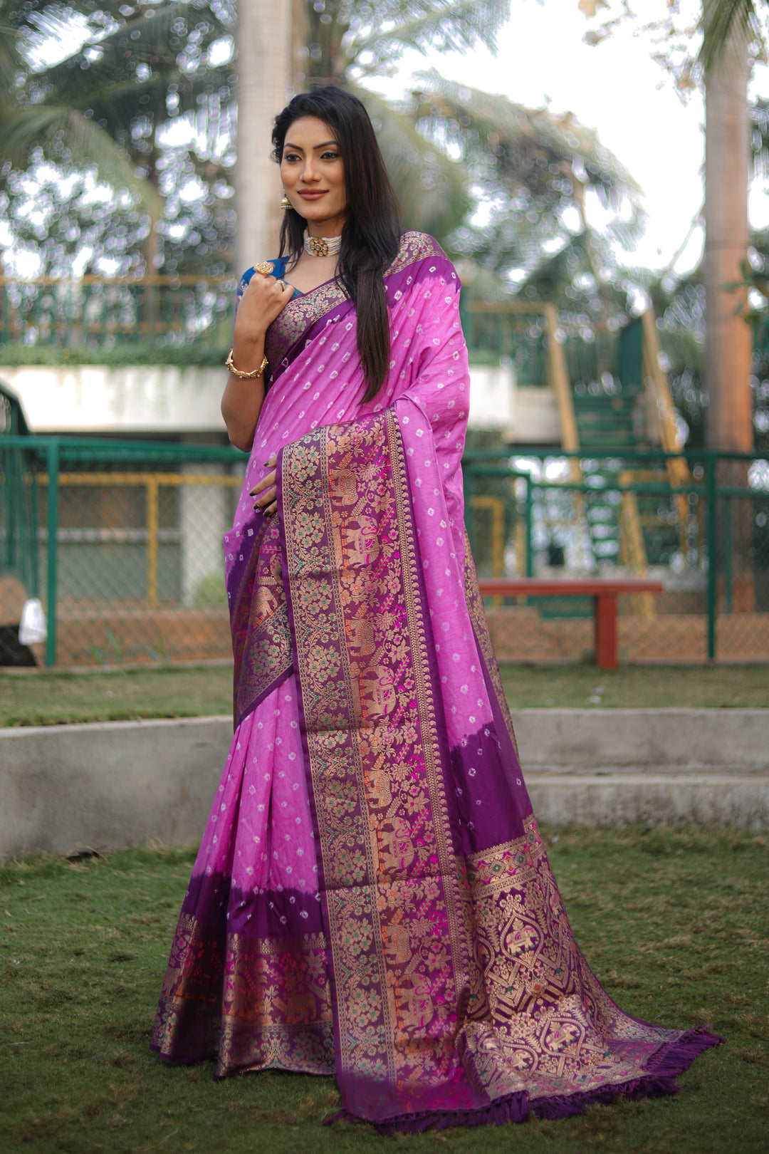 Gorgeous Purple Pure Bandhej Silk Saree with a designer Kanjivaram border and Minakari pallu.