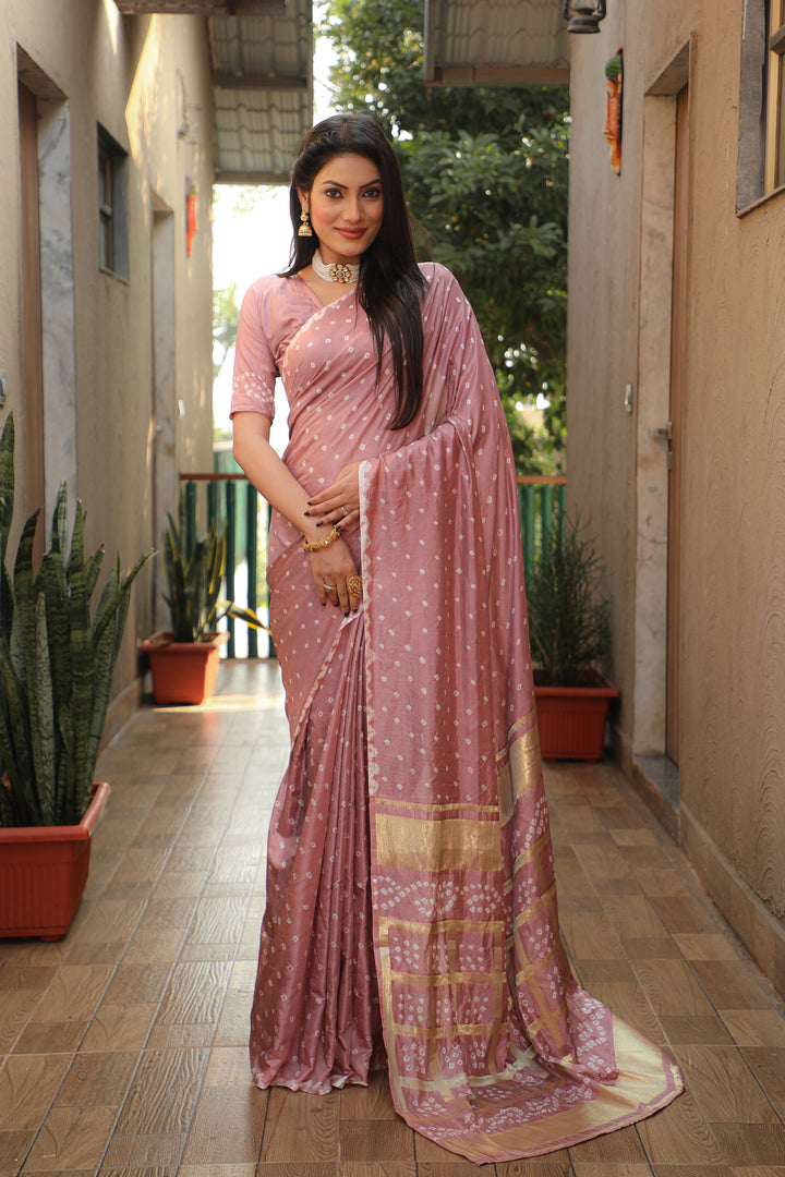 Stunning dusty-rose Bandhej silk saree with luxurious checks design and original craft.