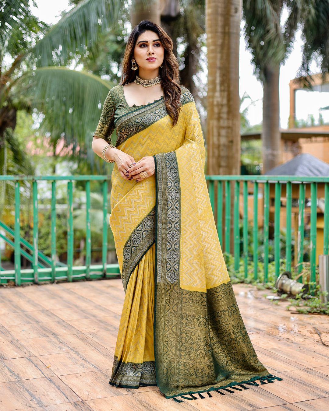 Elegant Yellow Pure Kanjivaram Saree with Leheriya design and luxurious heavy border.