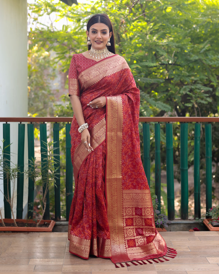 Bright-pink Patola Silk Saree with delicate Zari & Kanchi borders, perfect for USA festive occasions.