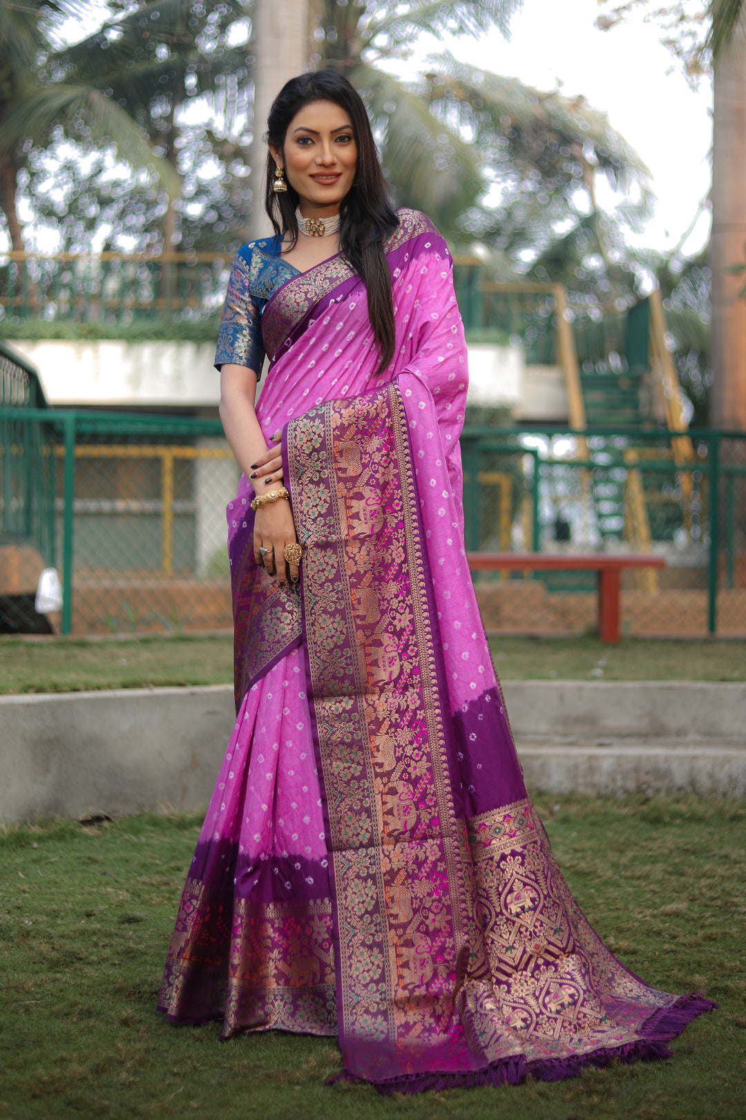 Purple Pure Bandhej Silk Saree with intricate Kanjivaram border and Minakari pallu for weddings.