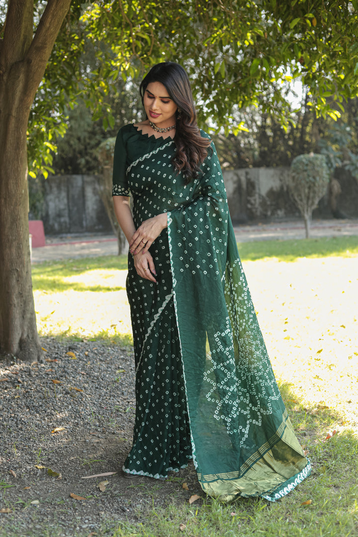 Stunning Green Bandhej Silk Saree with beautiful Zari weaving and original design for traditional wear.