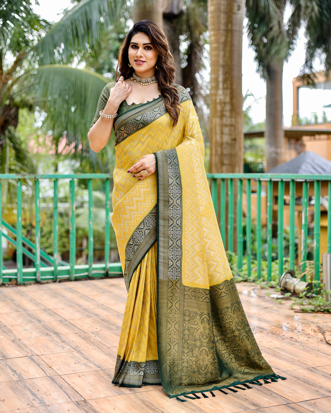 Premium Yellow Kanjivaram Pattu Saree with Leheriya design and stunning heavy border for bridal wear.