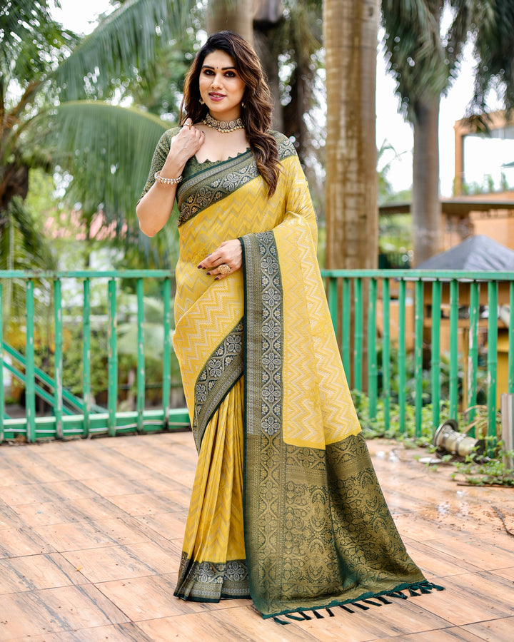 Premium Yellow Kanjivaram Pattu Saree with Leheriya design and stunning heavy border for bridal wear.