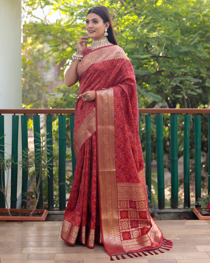 Elegant bright-pink Patola Silk Saree with rich Zari & Kanchi borders, ideal for grand USA events.